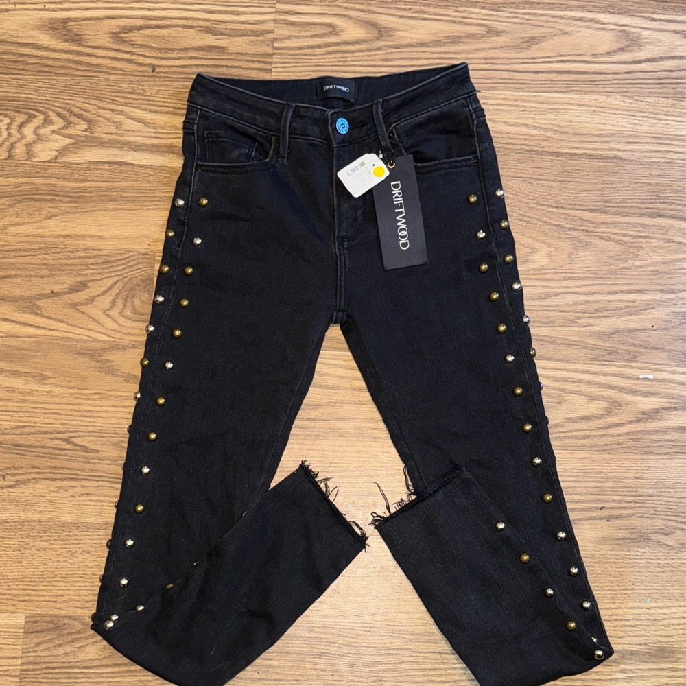 Women’s jeans with studded embellishments